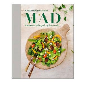 Bogen MAD – kunsten at spise godt og leve sundt er en hyldest til god mad, fremstillet af de allerbedste råvarer